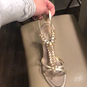 Giuseppe Zanotti Gold Heels with fishbone stones.